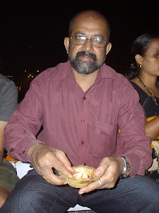 In the boat releasing  a "Diya" into the river ganges in Varanasi.(Thursday 10-11-2011).