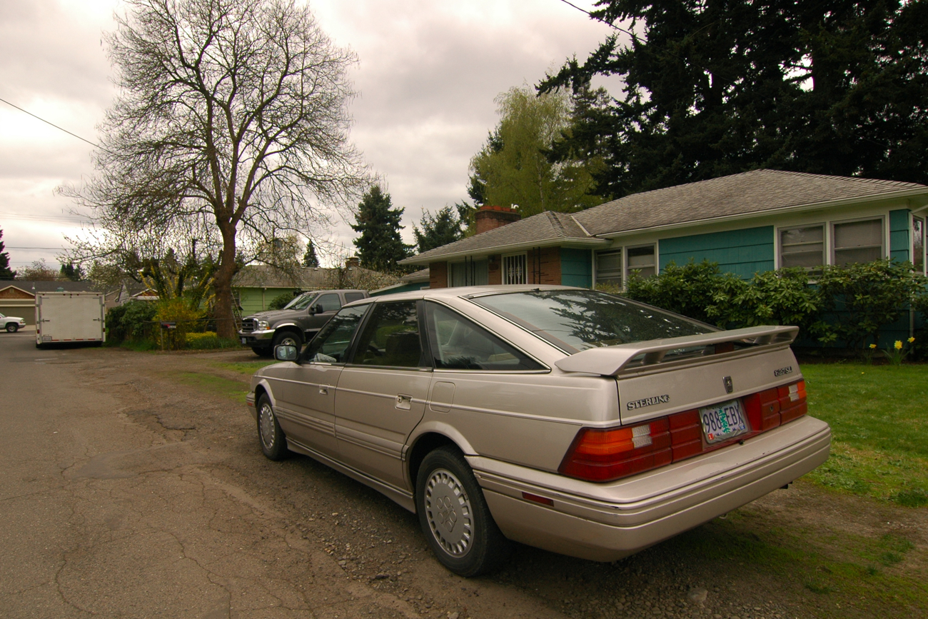 OLD PARKED CARS. 1989 Sterling 827 SLi Fastback.