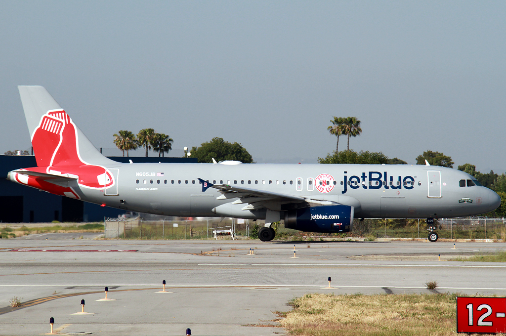 jetblue a320 boston sox livery aero flightlines pacific lima taxies departure rwy towards