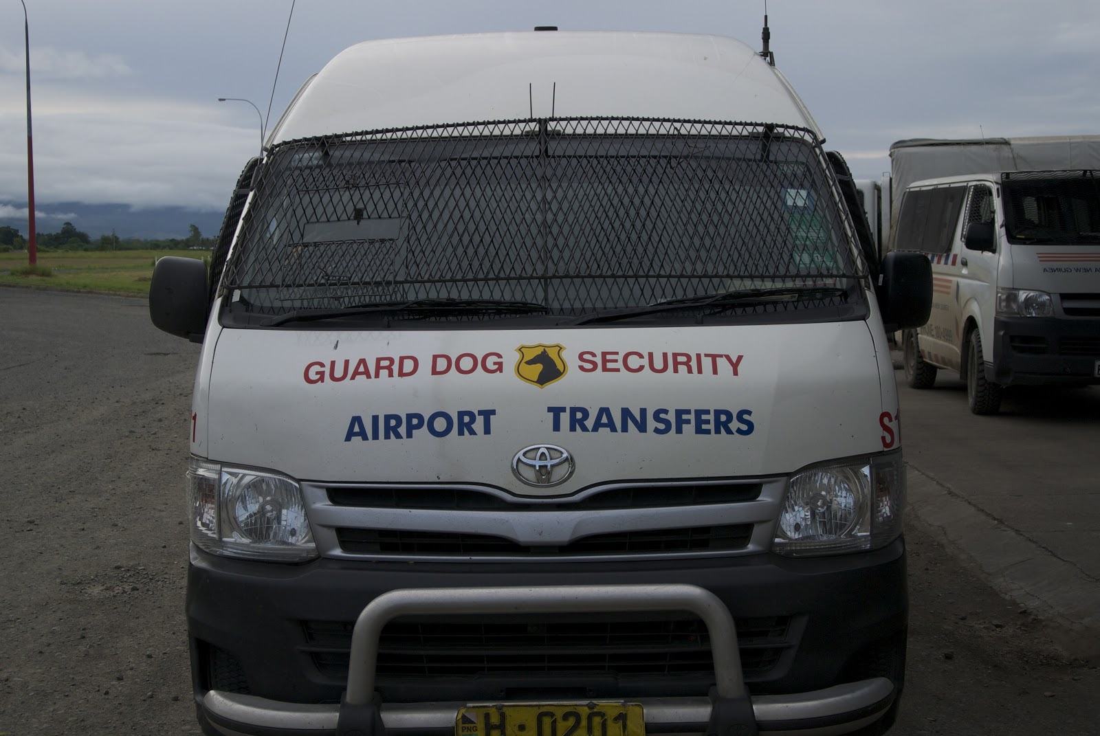 GlobalGoodFood Lae Nadzab Airport transfer Guard Dog Security Lae
