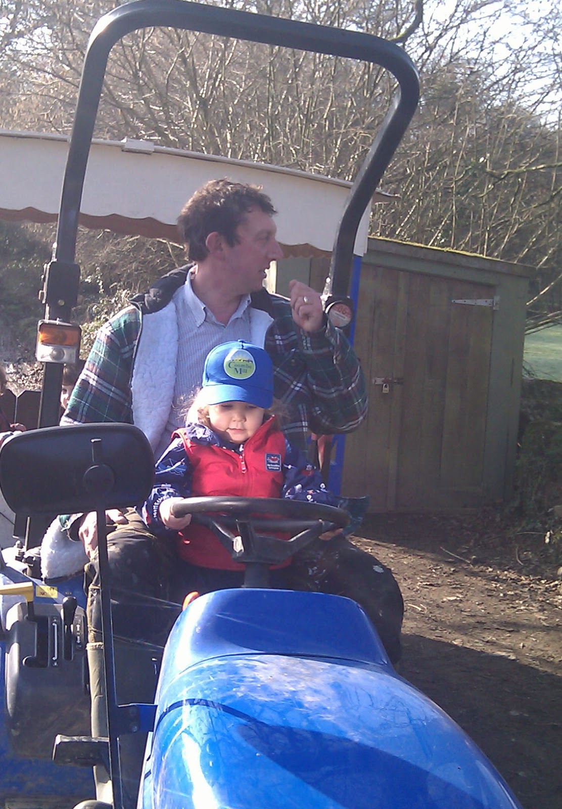 helping on the tractor