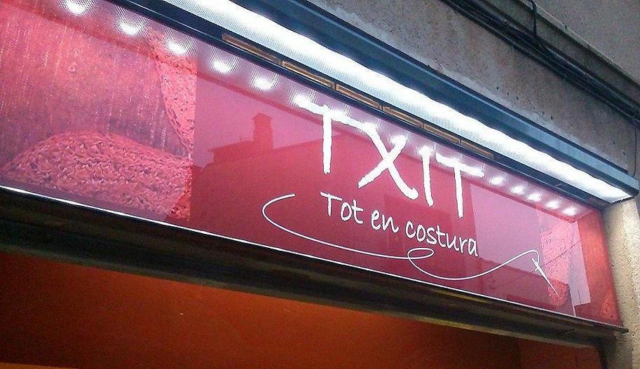 TXIT,                             tot en costura.