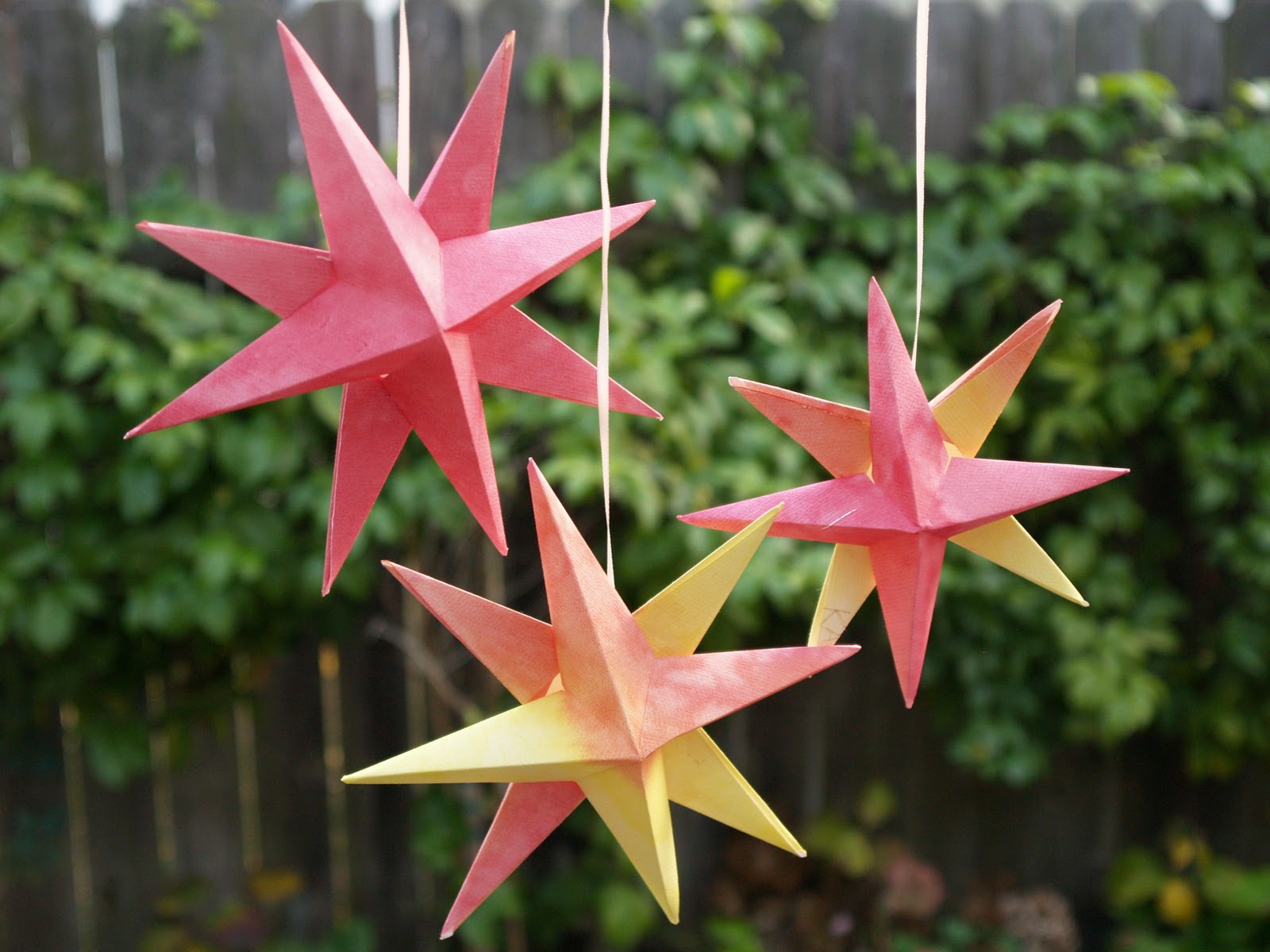 Folded Paper Christmas Origami Stars - The Magic Onions