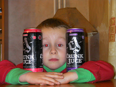 boy with cans of crunk juice or juce, alcoholic energy drink with fruit additives