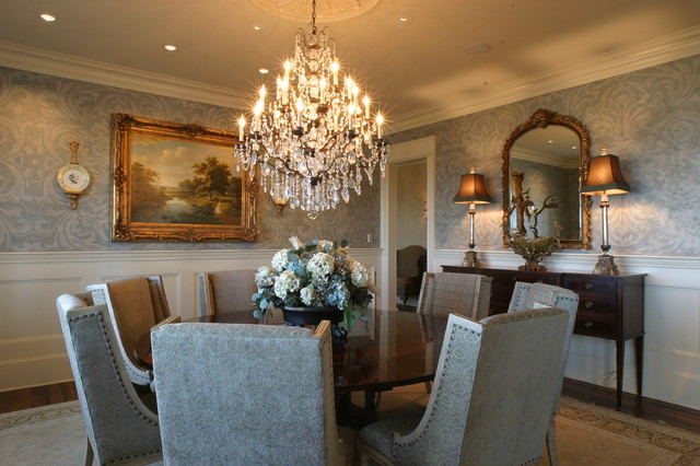 Black Round Dining Tables for Various Dining Room Designs Gorgeous Crystal Chandelier in the Dining Room with Wooden Round Dining Tables and Grey Chairs around it