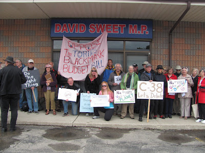 Protestors gather at MP David Sweet's office to oppose Omnibus Bill C-38 (Image Credit: Lorne Warwick)