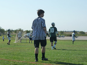 Dawson as a refree for lacrosse.