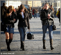 Girls in jeans and boots on the street