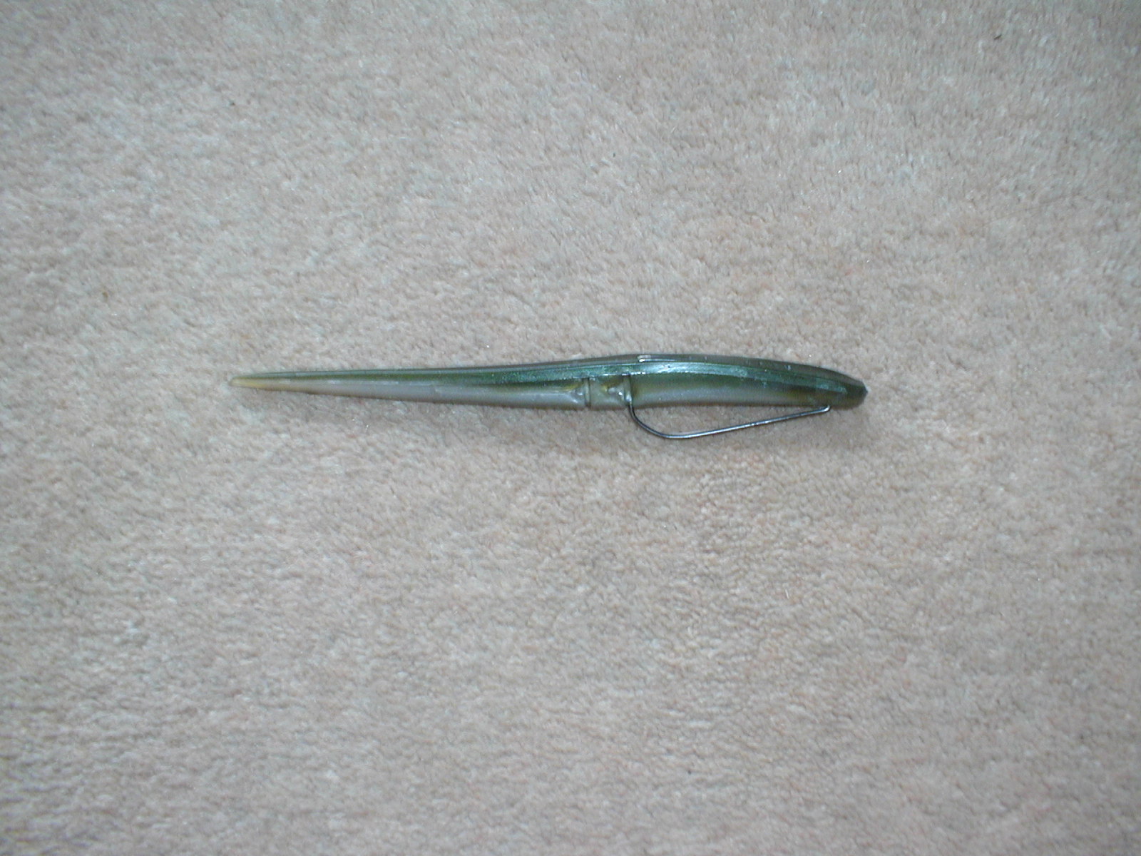 Cornish Shore and Kayak Fisherman Sea Bass Fishing with Weedless Soft