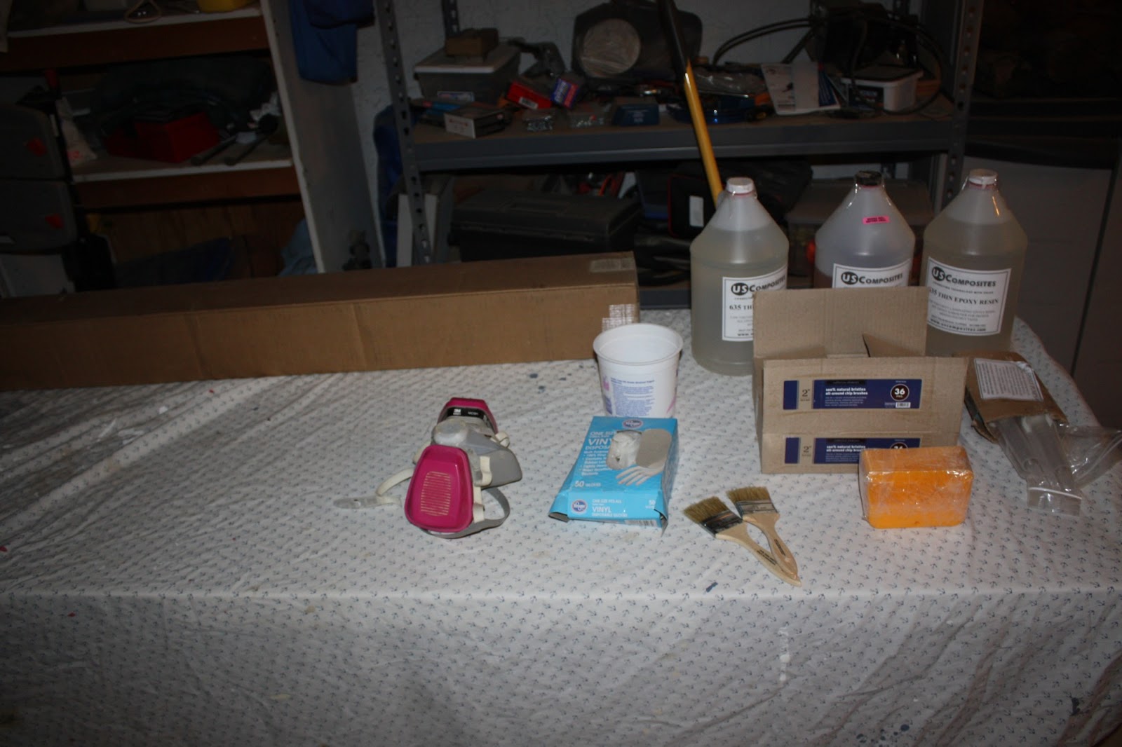 Cedar Strip Canoe Mixing Epoxy for Fiberglassing