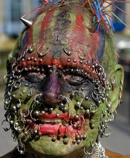 Extreme Face Tattoos and Piercing