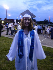 Outside after the graduation ceremony.