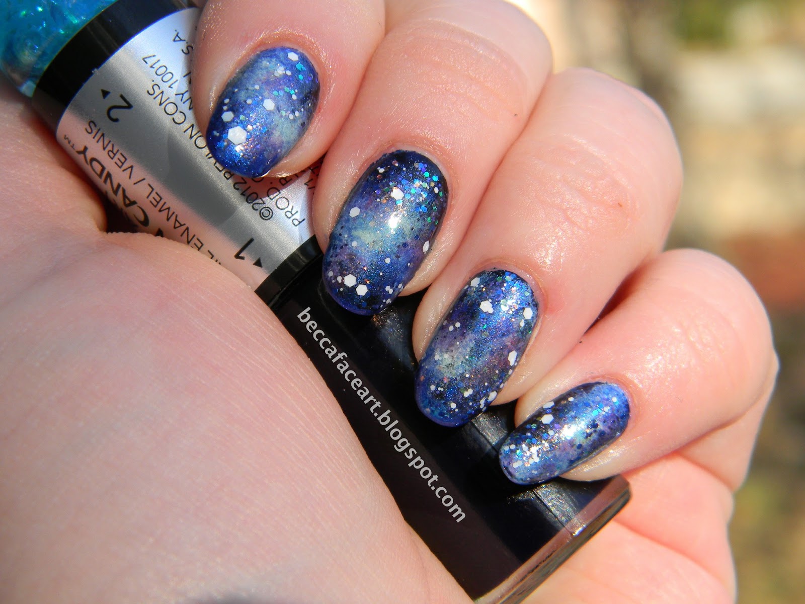 blue galaxy nail art