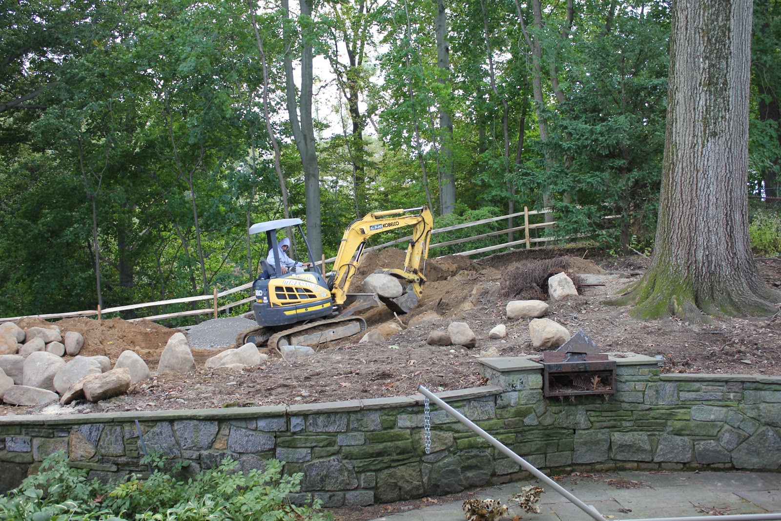 Gardening and Gardens: Backyard Renovation Part 4: Boulder Retaining Wall