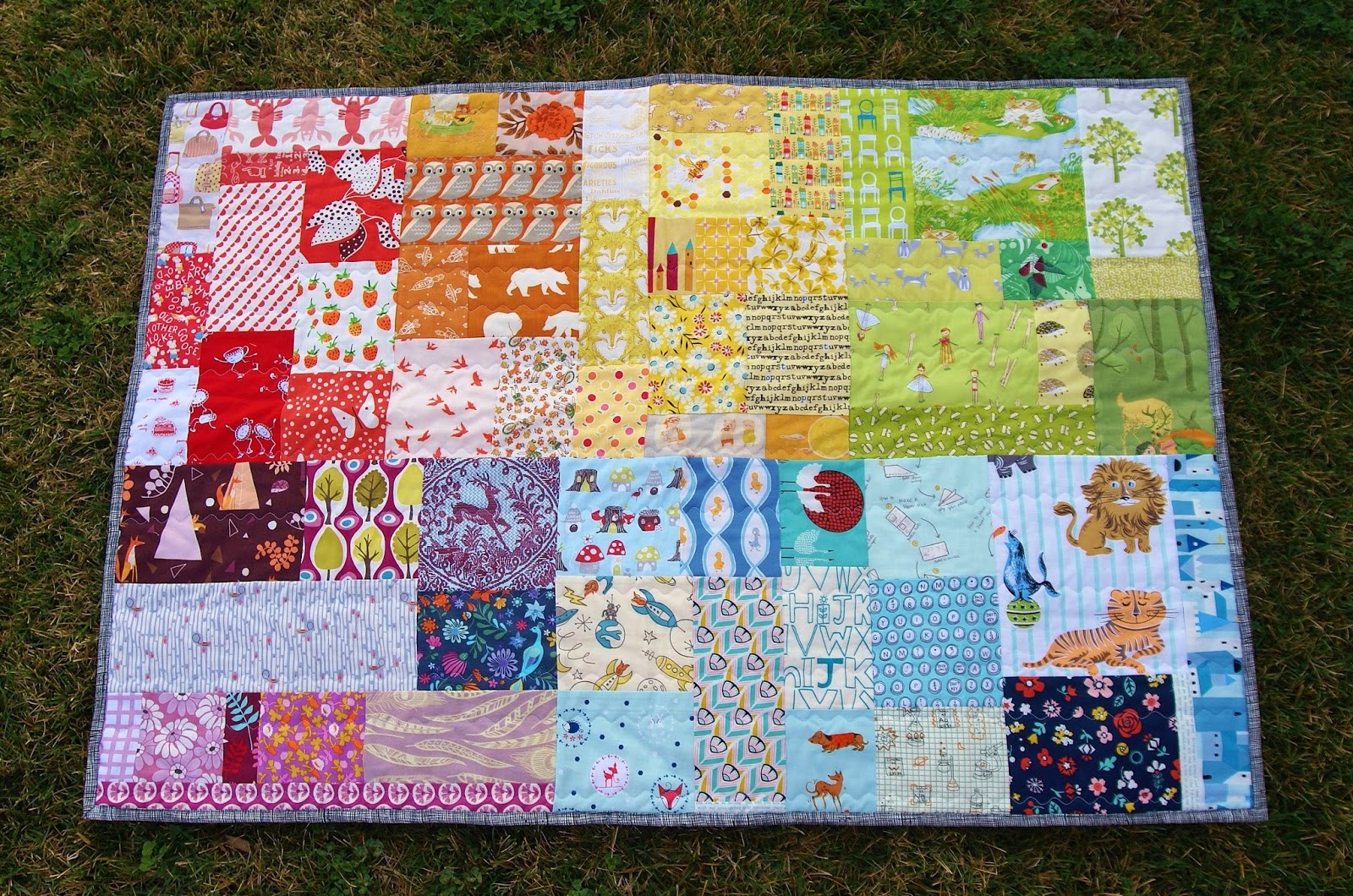 Rainbow Patch Scrappy Baby Quilt by Heidi Staples of Fabric Mutt