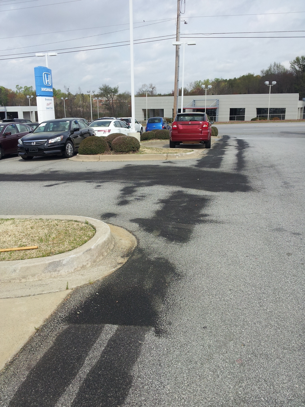 Hydraulic Oil Stains On Asphalt? EATOILS™ BT200™ Safely Fades Them Away™