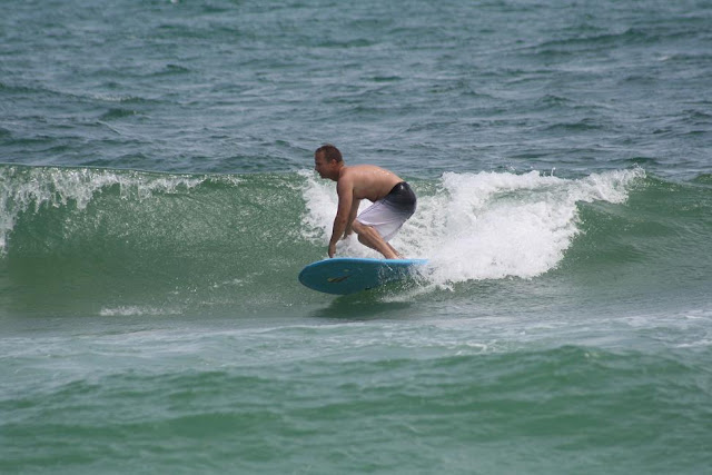 Longboarder Surfing at Pensacola Beach on Sunday May 13, 2012