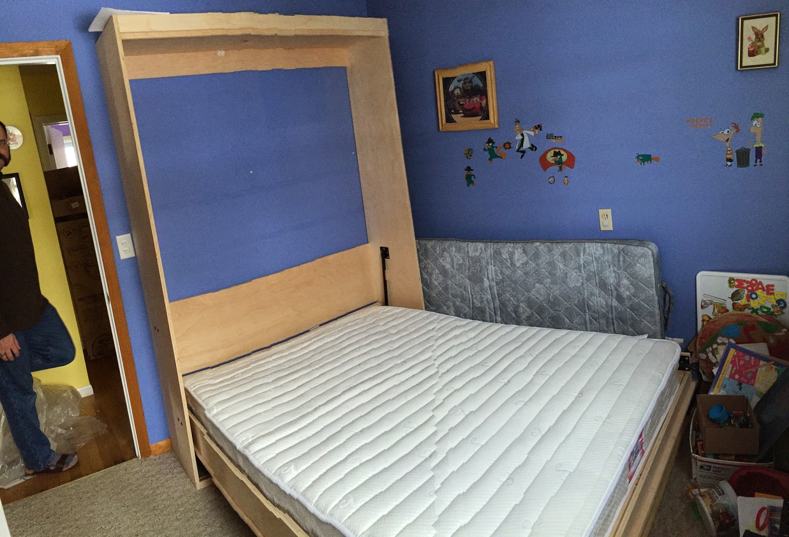Photo of the Murphy bed open, with mattress installed.