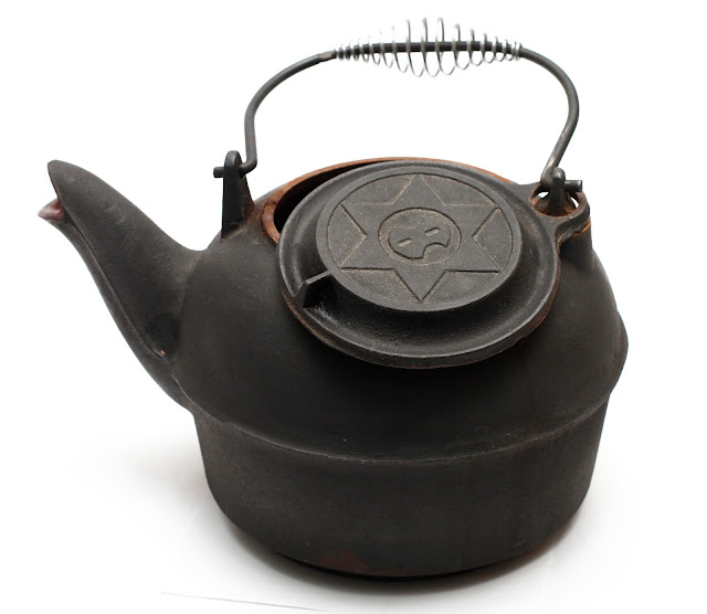 Grandma's Attic Auction Catalogue Antique Bird Spout Stove “Star 8