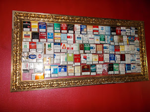 Classic satirical portrait of "CIGARETTE BRANDS" in "Do Step Inn" hostel  relaxation lounge.