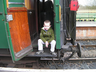 open door of steam train passenger carriage footplate