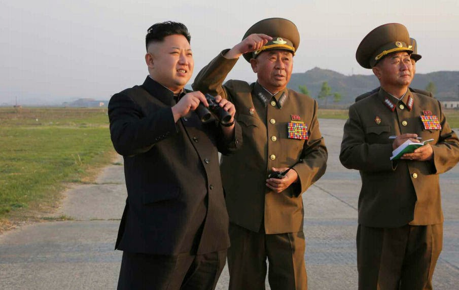 النشاطات العسكريه للزعيم الكوري الشمالي كيم جونغ اون .......متجدد  Kim+Jong-un+guiding+Air+Force+MiG-21+during+flight+training+6