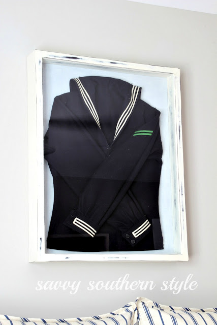 uniform in frame as wall art, by Savvy Southern Style featured at I Love That Junk