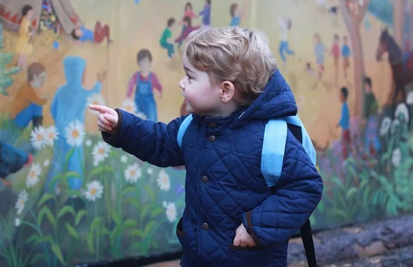 Prince William,and Kate Middleton have released two photographs to mark the occasion. They show Prince George standing in front of the mural on the outside of the nursery building