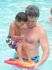 Alexandre and Dad playing in the pool in NH