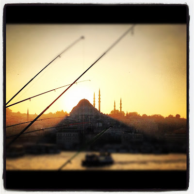 A view of the mosque from the Galata Bridge for tourists in Istanbul