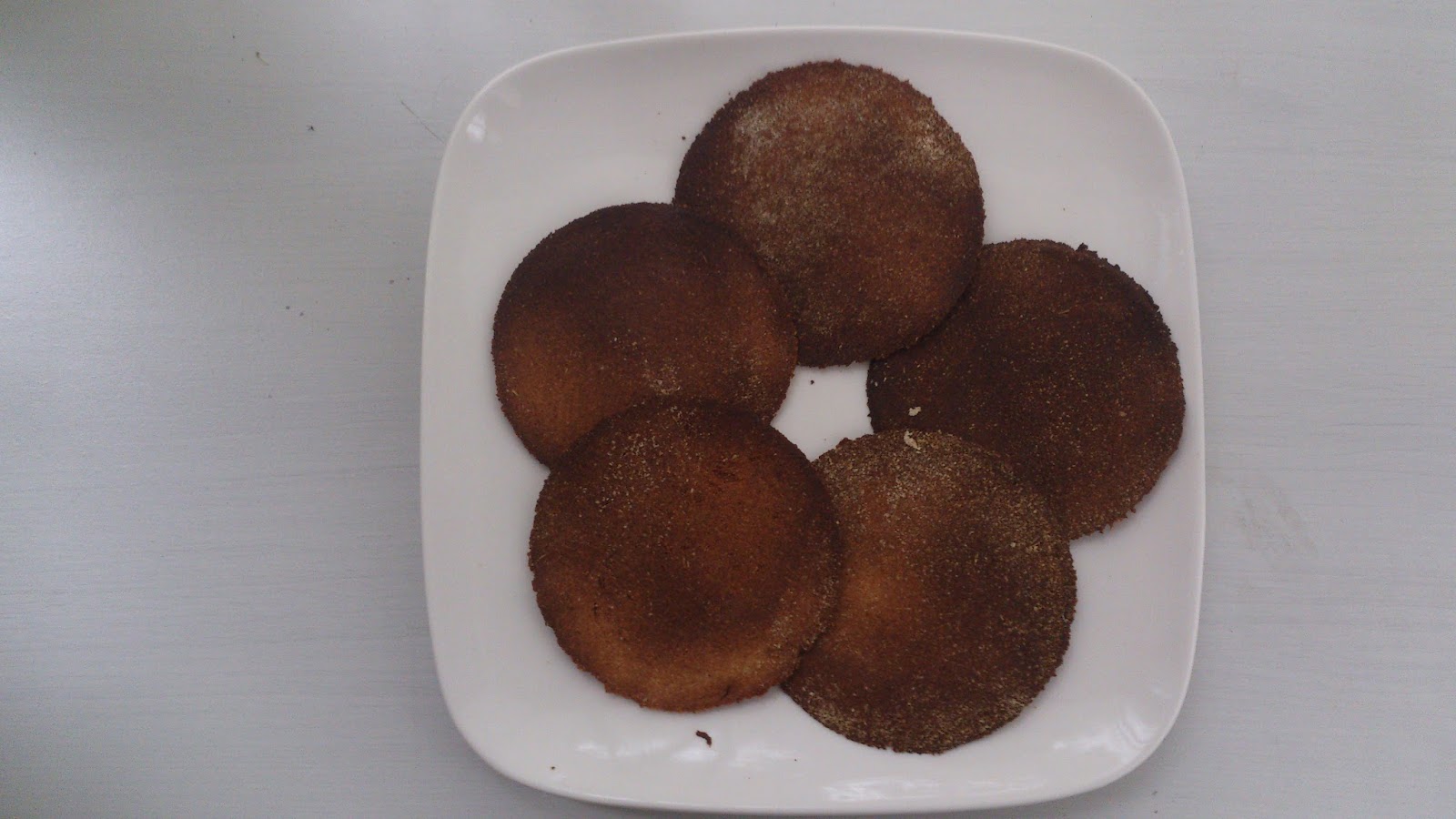 Ancient Hellenic honey cakes Baring the Aegis