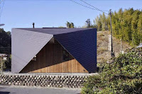 Origami House Design with A-Frame in an Old Village Surrounded by Mountains Origami House Design with A-Frame in an Old Village Surrounded by Mountains