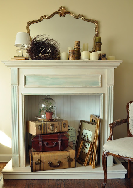 Creat vignettes in your faux fireplace