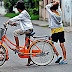 Dinda riding a bike