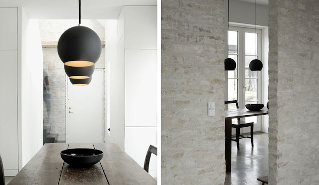 Two views of a modern dining room with matte black dome pendant lights hanging over a wooden dining room table