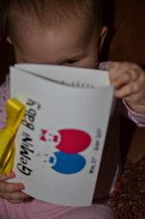 Baby opening a present