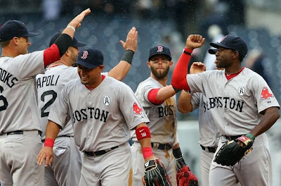 The Red Sox celebrate winning game one against the Yankees The Red Sox celebrate winning game one against the Yankees