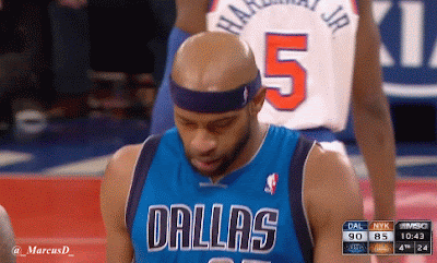 J.R. Smith messes with Vince Carter headband