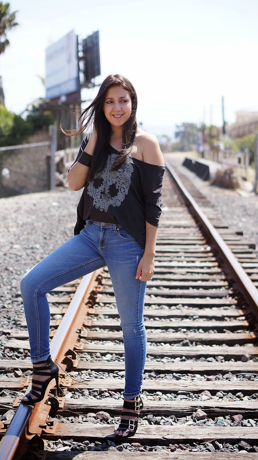 Fashion blogger, Latina Fashion blogger, casual outfit, Mossimo Saphire Strappy heels, Target heels, Off the shoulder top, skull shirt, free spirit, railroad tracks 