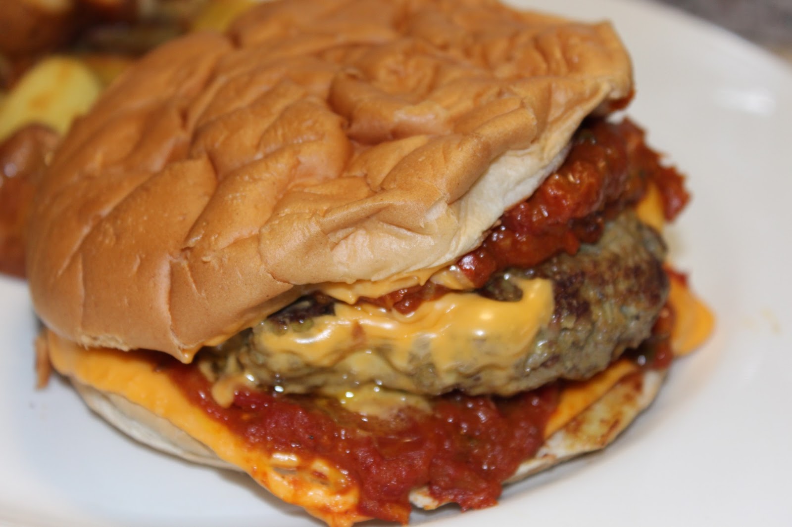 FLOWER POT KITCHEN LAMB MADRAS BURGER WITH A HOT CURRY TOMATO CHUTNEY