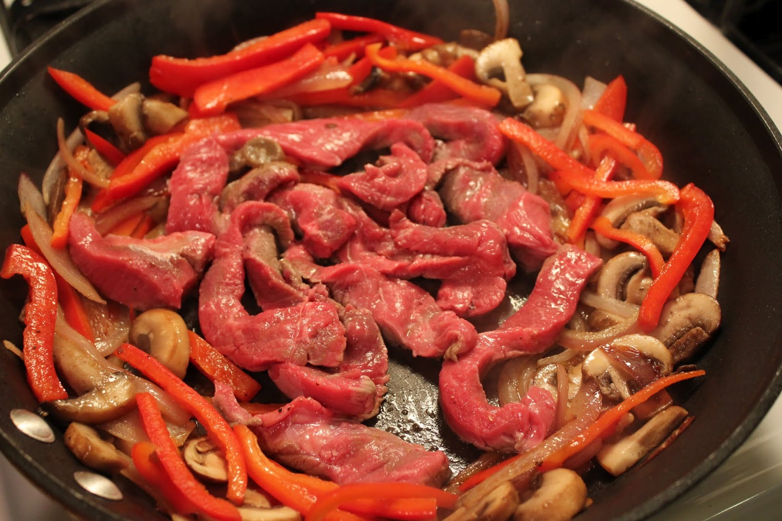 Everything in the Kitchen Sink Mango Beef Stir Fry