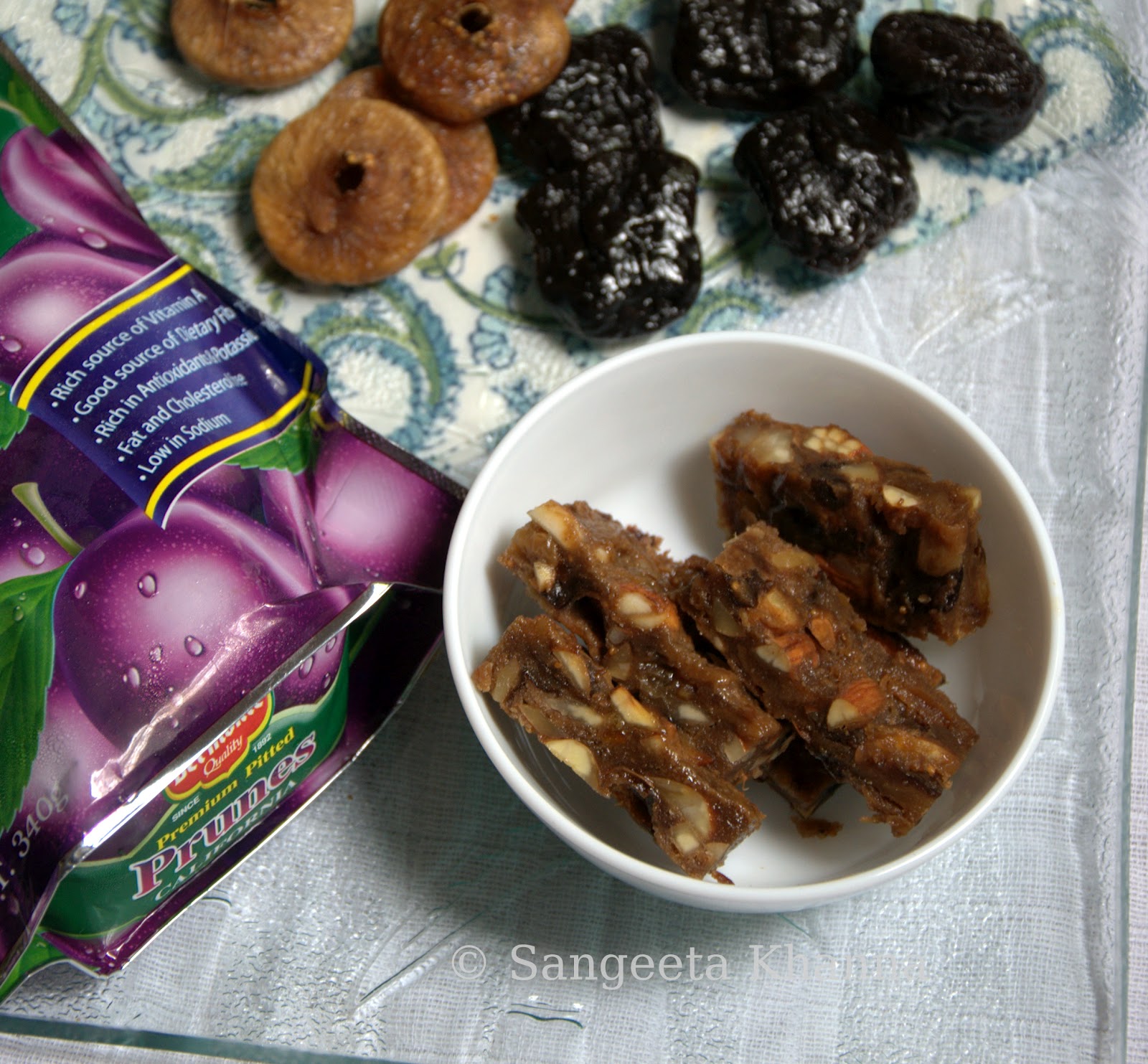 a gluten free Panforte dried prunes, figs and nuts together in a