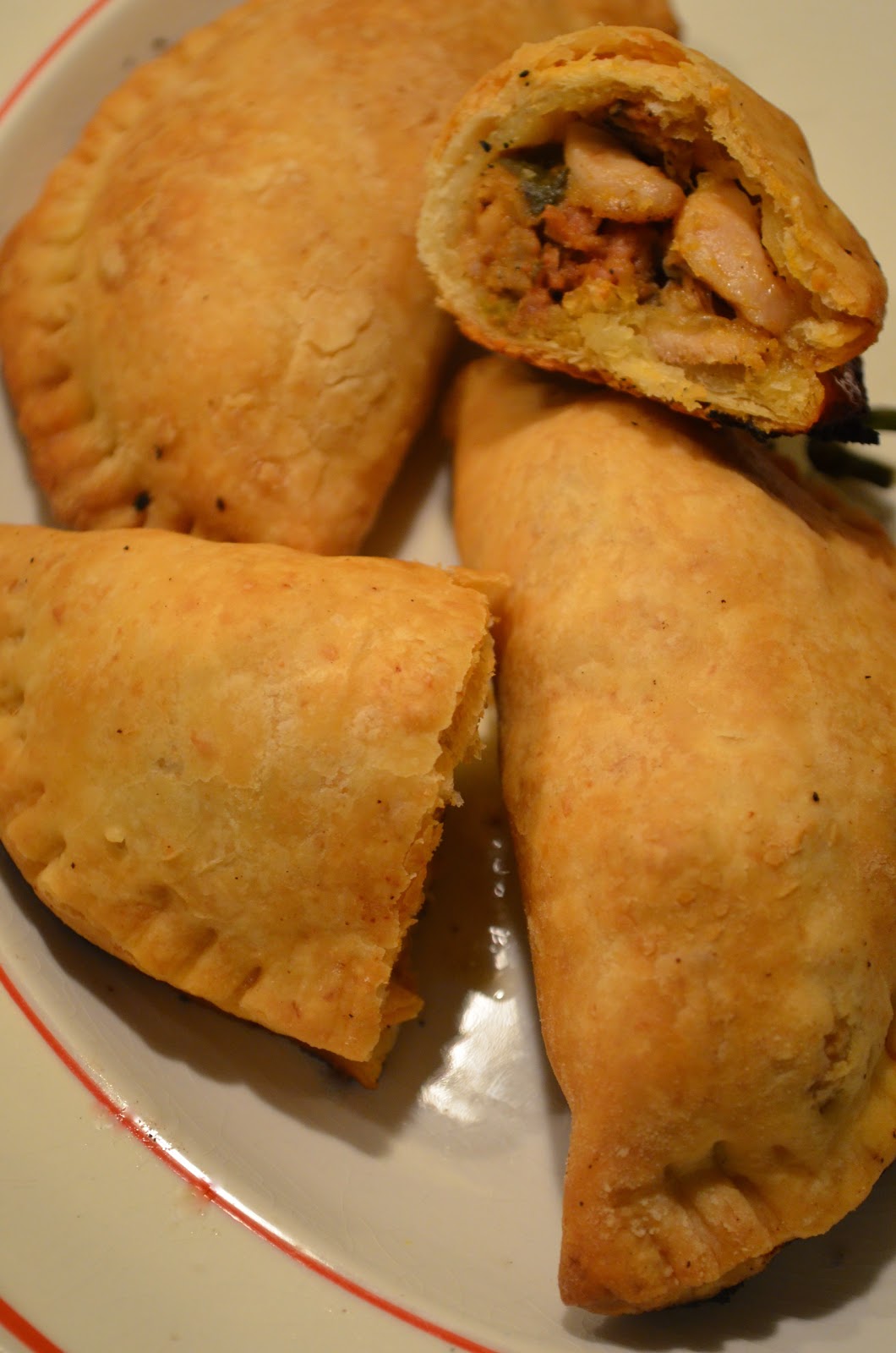 amour fou(d) chicken empanadas with sausage and olives.