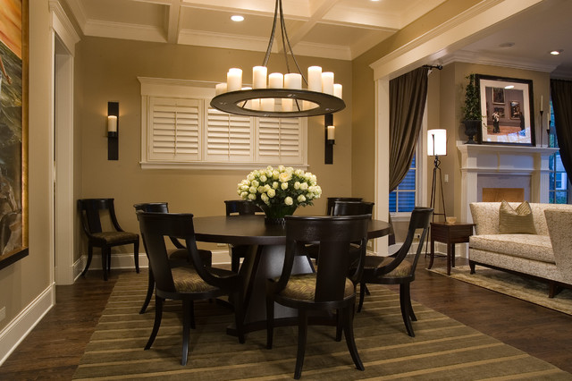Black Round Dining Tables for Various Dining Room Designs Stunning Dark Round Dining Tables and Dark Chairs under the Ring Iron Chandelier on White Ceiling