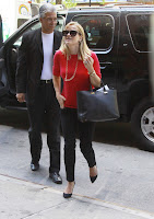 Reese Witherspoon tight black pants and heels