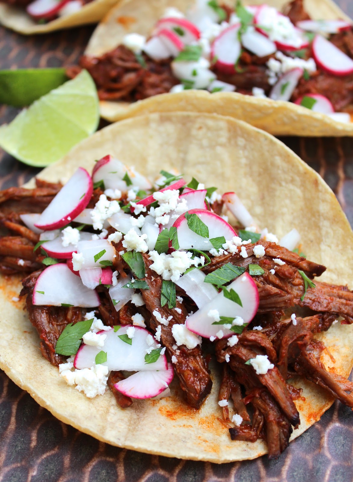 Braised red chili beef tacos with radish salsa & cotija lieslicious