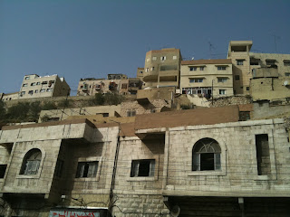 a group of buildings on a hill