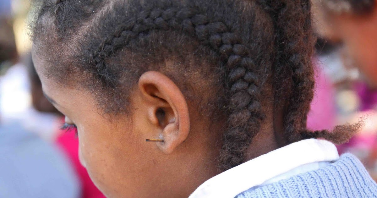 FAMILY FROM AFAR Ear Piercing in Ethiopia