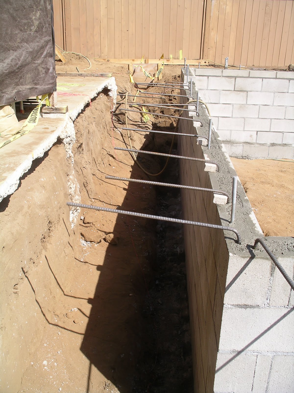 Home Remodeling Step By Step Step 12 Grouting the Retaining Wall