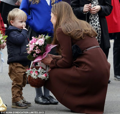 boy picks his nose with dutchess